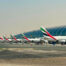Row of planes parked at Dubai airtport